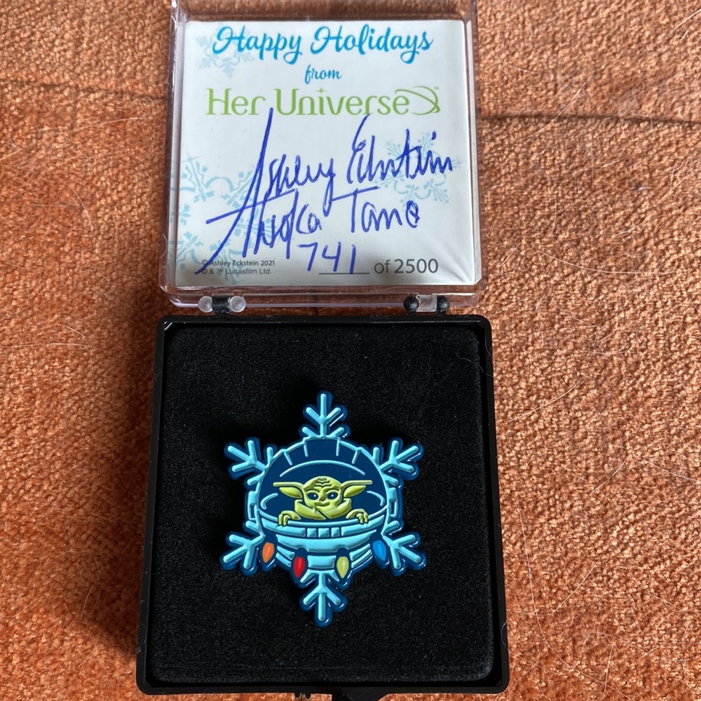 Signed by Ashley Eckstein limited 2021 holiday pin. Grogu, #741 out of 2500.